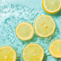 High angle view of lemon slice in swimming pool