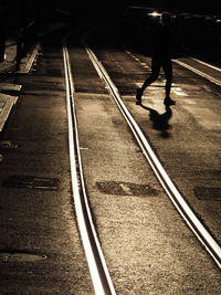 People walking on railroad station platform