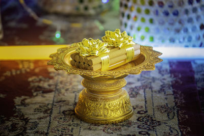 Close-up of chess pieces on table