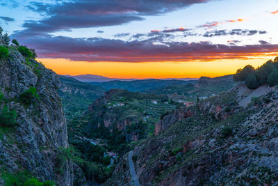 Scenic view of mountains against sky during sunset