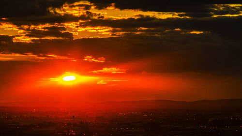 Scenic shot of silhouette landscape at sunset