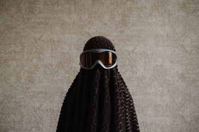 Funny child in a ghost costume. idea for halloween. funny kids. children's creativity. 