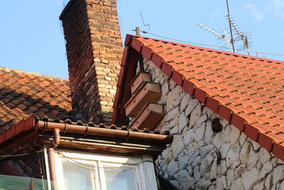 Low angle view of building against blue sky