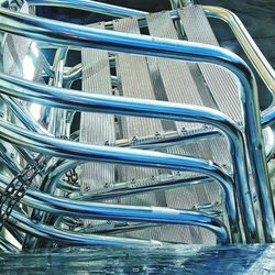 Close-up of cables against blue sky