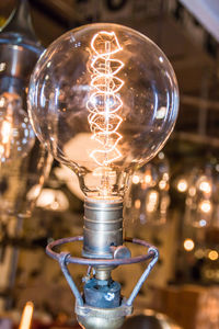 Close-up of illuminated light bulb