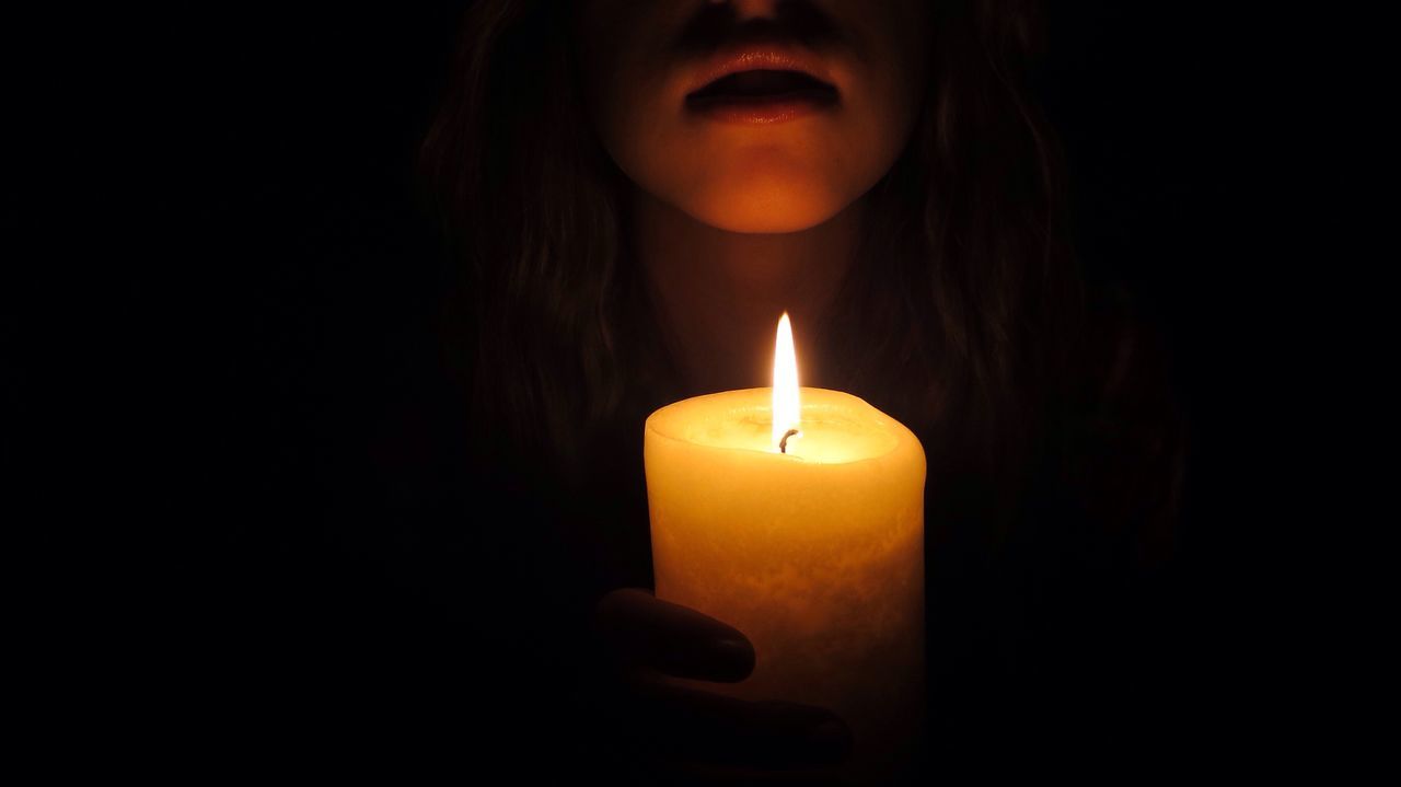 flame, burning, candle, illuminated, lit, heat - temperature, fire - natural phenomenon, indoors, glowing, studio shot, copy space, close-up, darkroom, fire, dark, black background, lighting equipment, candlelight