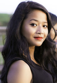 Close-up portrait of beautiful woman with long hair