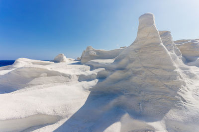 Scenic view of snow covered mountain against sky