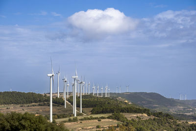 Wind turbine in agricultural fields in the province of tarragona in catalonia spain