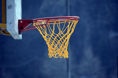 Low angle view of basketball hoop against sky