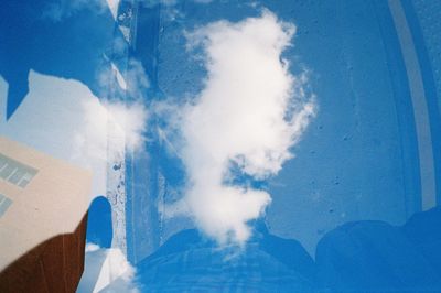 View of trees against blue sky