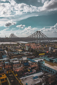 High angle view of city and buildings against sky