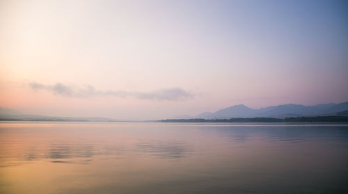 Scenic view of sea against sky during sunset