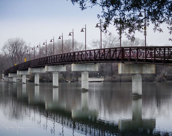 Bridge over river against sky