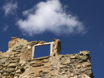 Low angle view of castle against blue sky