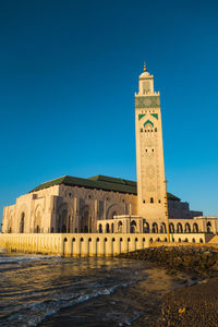 Low angle view of building against blue sky