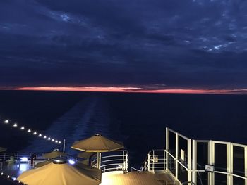 Scenic view of sea against sky at night