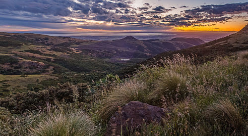 Scenic view of landscape against sky during sunset