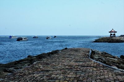 Scenic view of sea against clear sky