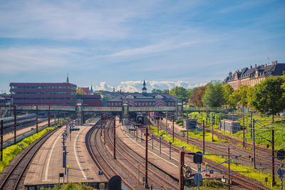 Railoads and pedestrian bridge on Østerport main line railway station in copenhagen, denmark.