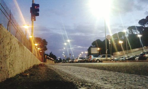 View of illuminated street at night