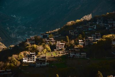 High angle view of townscape by sea