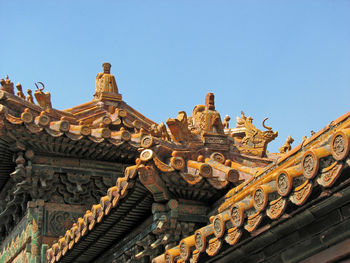 Imperial roof decoration in forbidden city, beijing 