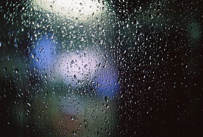 Close-up of water drops on glass