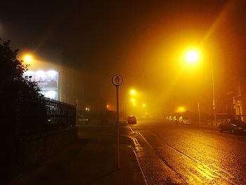 Illuminated street light at night