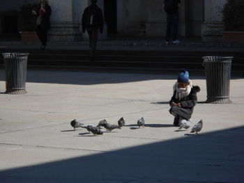People on street in city