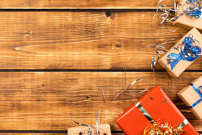 High angle view of telephone booth on wooden table