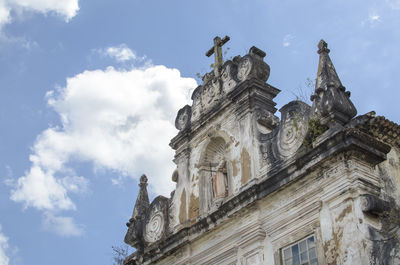 Low angle view of the facade of a historic church.