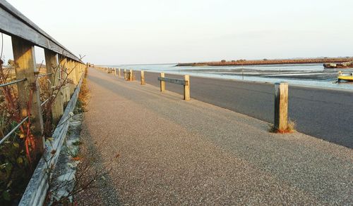 Scenic view of beach against clear sky