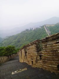 View of castle on mountain against sky