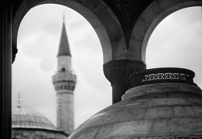 Mosque seen through arch
