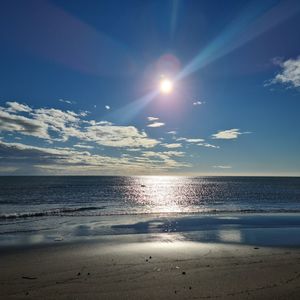 Scenic view of sea against sky at sunset