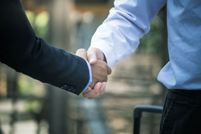 Close-up of hand holding hands