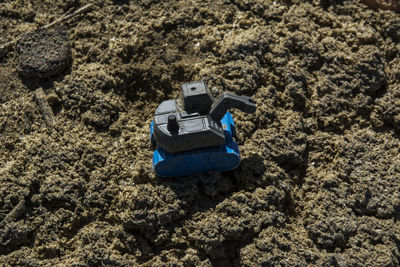 High angle view of toy car on rock