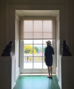 Woman standing in the dark