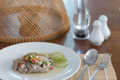 High angle view of food in plate on table