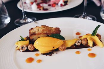 High angle view of mango sorbet on plate