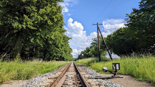 Railroad track against sky