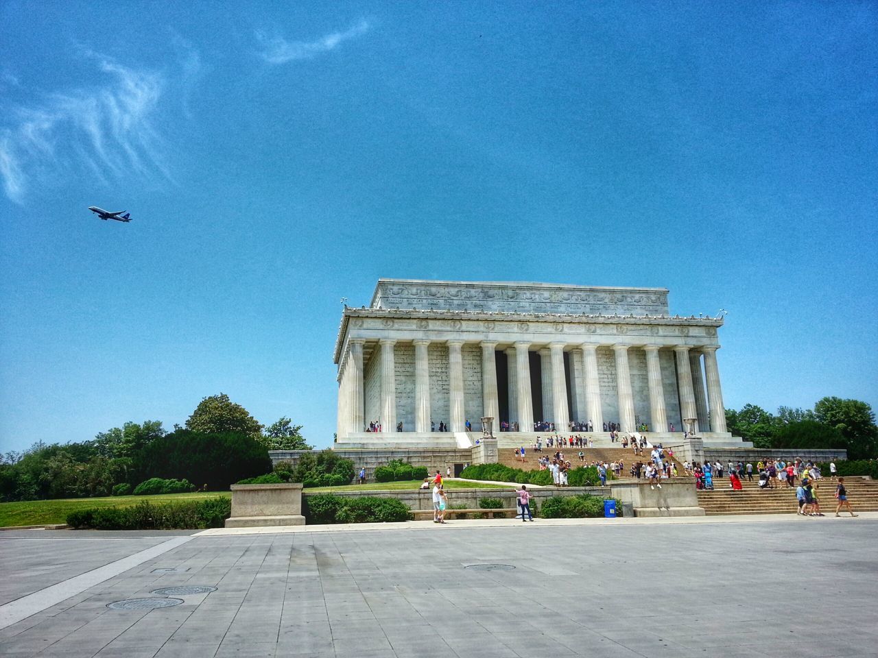 architecture, built structure, building exterior, large group of people, famous place, tourism, history, travel destinations, tourist, travel, person, blue, leisure activity, men, lifestyles, international landmark, sky, tree, low angle view