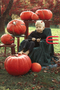 View of pumpkins on field during autumn