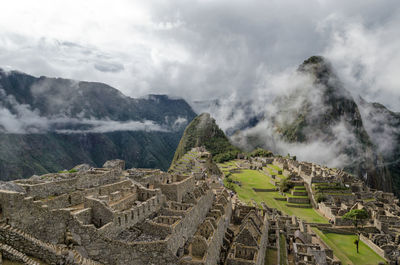 Panoramic view of a mountain against cloudy sky