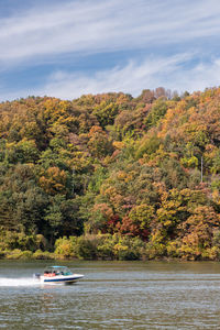 Scenic view of lake against sky during autumn