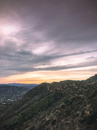 Scenic view of landscape against sky during sunset