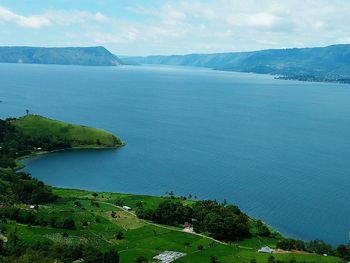 High angle view of bay against sky