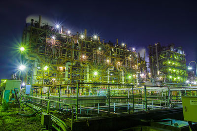 Oil refineries in factory zones at night.