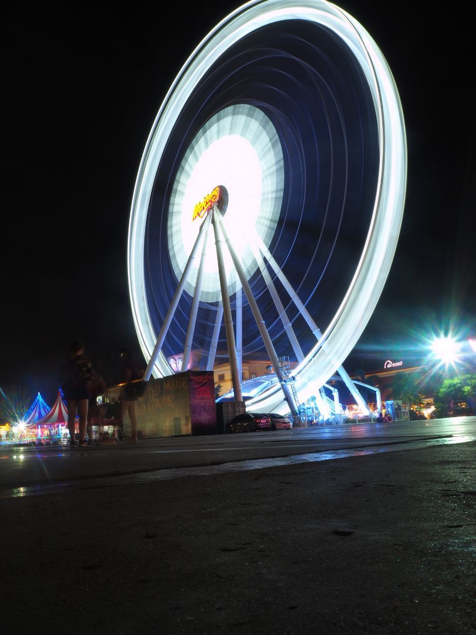 night, ferris wheel, illuminated, amusement park, amusement park ride, arts culture and entertainment, built structure, long exposure, building exterior, architecture, motion, sky, outdoors, city, no people